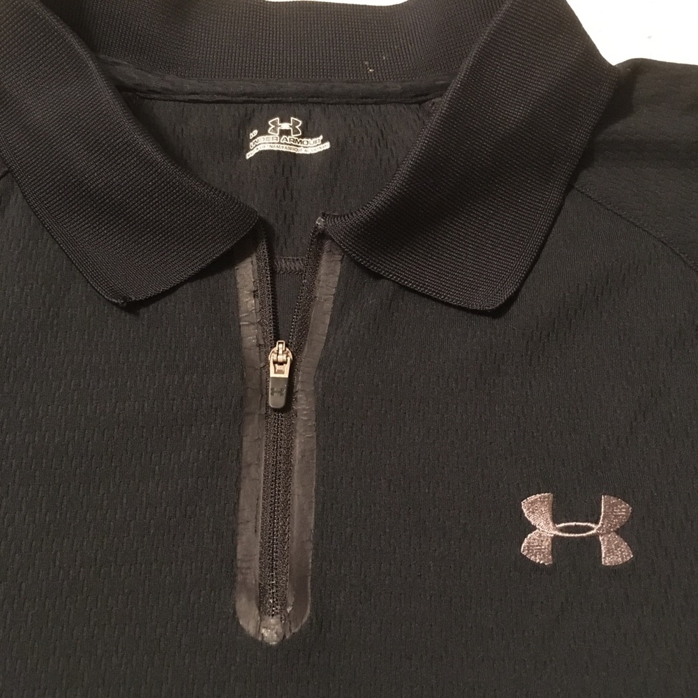 Under Armour black polo with zipper at the neck gently used size L